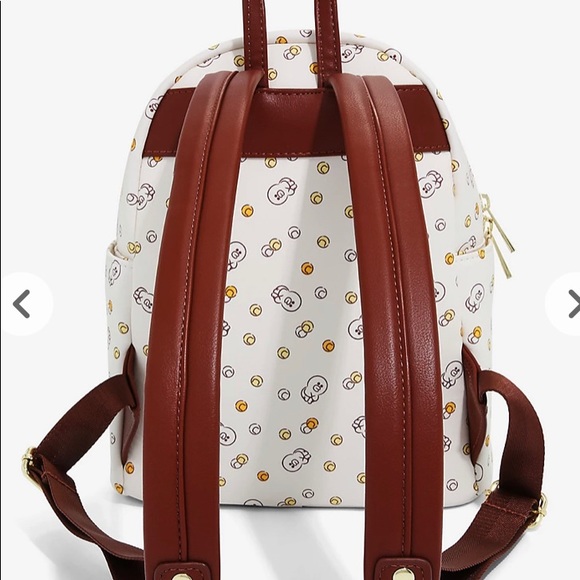 Brown and Friends faux leather mini backpack/ and free pair of matching socks